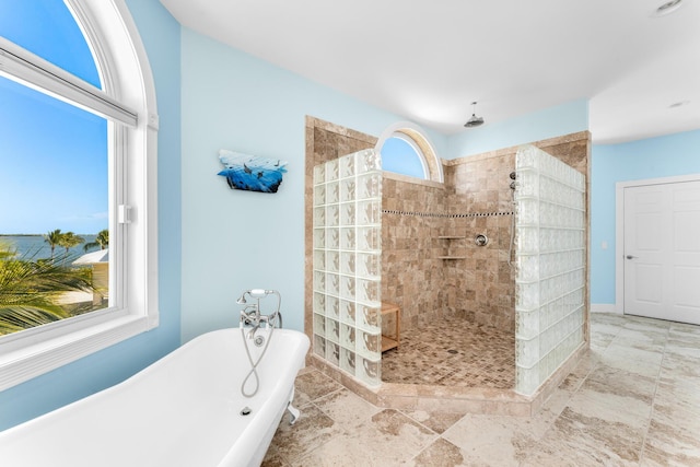 3742 Seagrape St, Big Pine, FL 33043 - full bathroom featuring a freestanding tub, a walk in shower, and baseboards