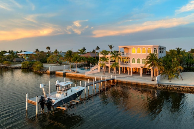 3742 Seagrape St, Big Pine, FL 33043 - dock area with boat lift, a water view, a balcony, and a patio area