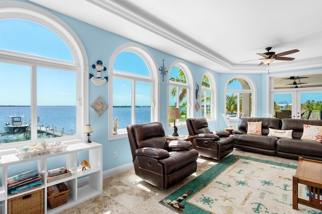 3742 Seagrape St, Big Pine, FL 33043 - living room featuring ceiling fan, a water view, and baseboards