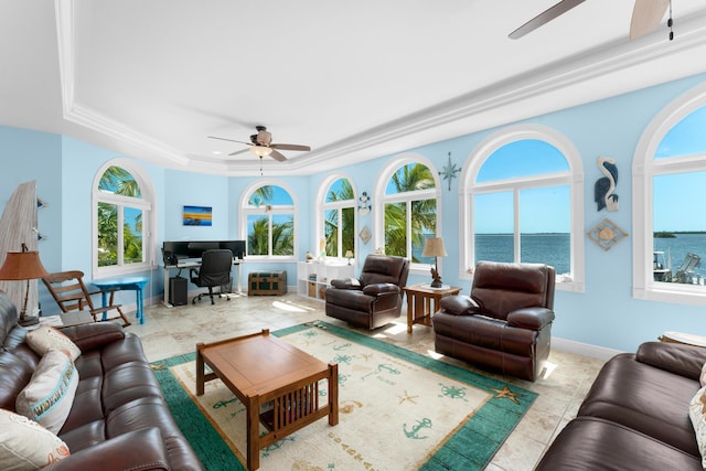 3742 Seagrape St, Big Pine, FL 33043 - tiled living area with ceiling fan, a raised ceiling, and healthy amount of natural light