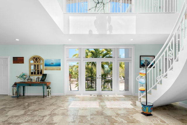 3742 Seagrape St, Big Pine, FL 33043 - entrance foyer featuring stairs, a towering ceiling, stone finish flooring, baseboards, and recessed lighting