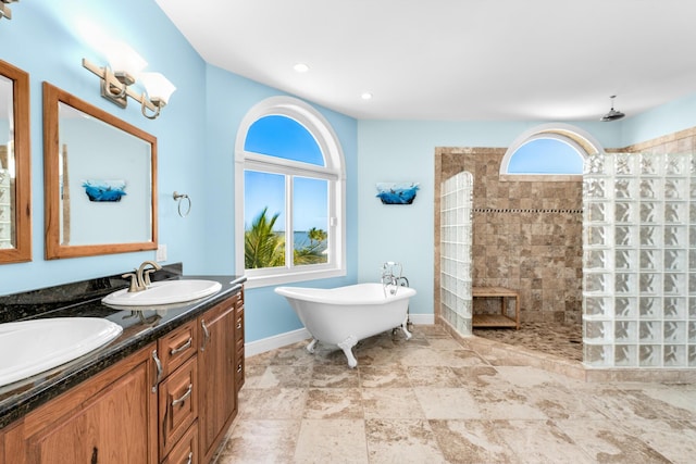 3742 Seagrape St, Big Pine, FL 33043 - bathroom with walk in shower, double vanity, a freestanding tub, baseboards, and recessed lighting