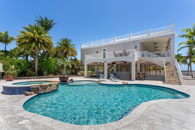 3742 Seagrape St, Big Pine, FL 33043 - view of swimming pool with a ceiling fan, a patio, stairway, and a pool with connected hot tub