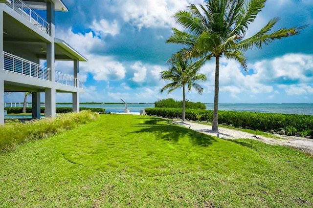 view of yard with a water view