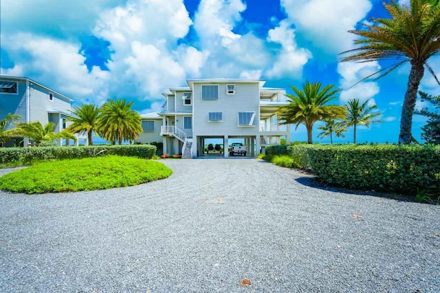 view of front of home featuring a carport