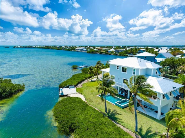 drone / aerial view featuring a water view