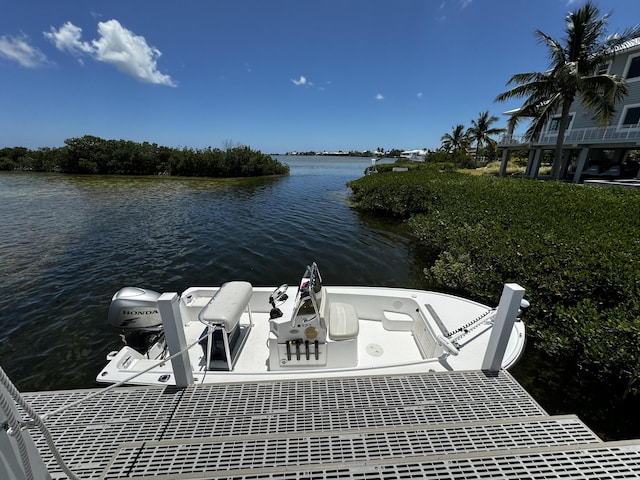 view of dock with a water view