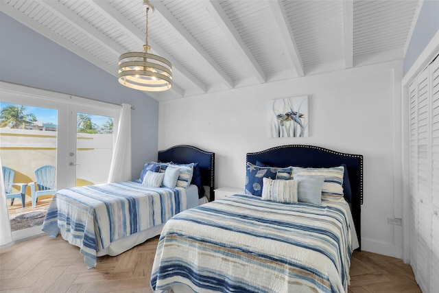 bedroom with parquet flooring, vaulted ceiling with beams, a notable chandelier, and french doors