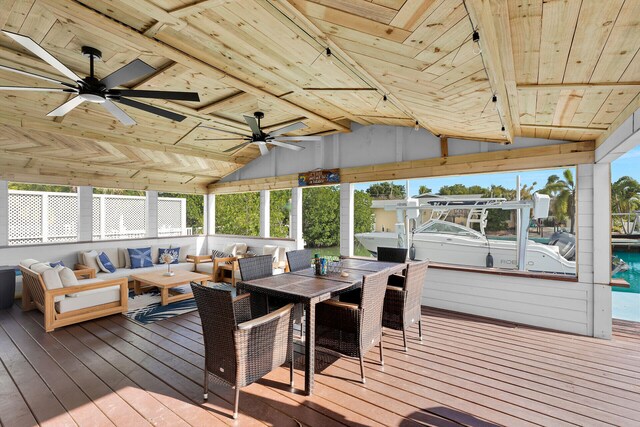 deck featuring outdoor lounge area and ceiling fan