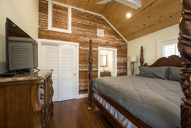 bedroom with wood ceiling, vaulted ceiling, and dark wood-type flooring