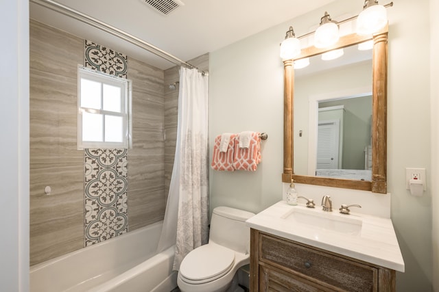 full bathroom featuring vanity, toilet, and shower / bath combo