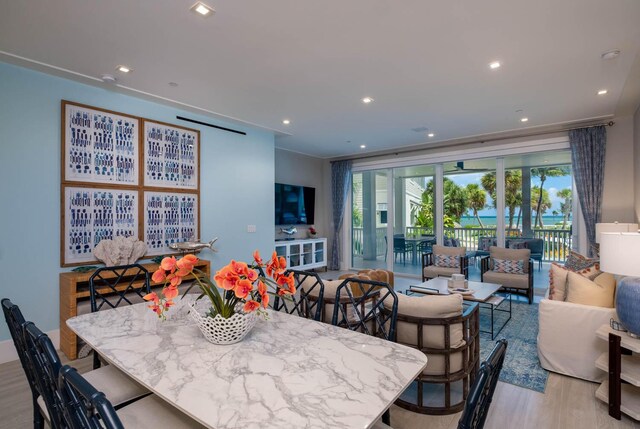 dining area with light hardwood / wood-style flooring