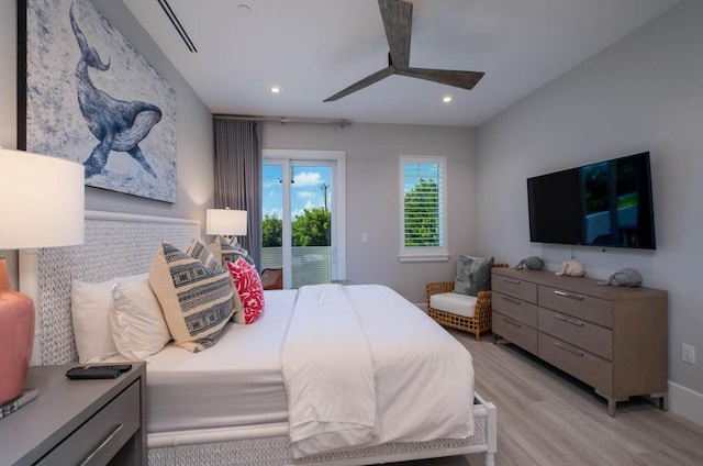 bedroom featuring access to exterior, ceiling fan, and light hardwood / wood-style flooring