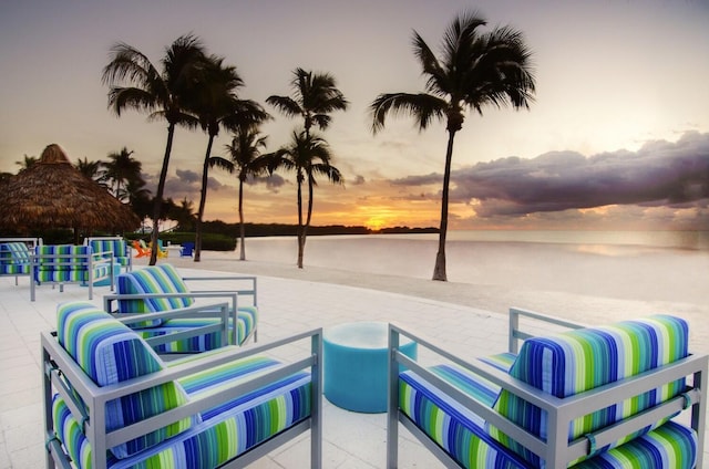 patio terrace at dusk with a water view