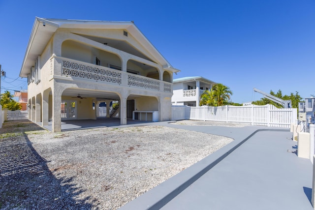 exterior space with a carport and a patio area