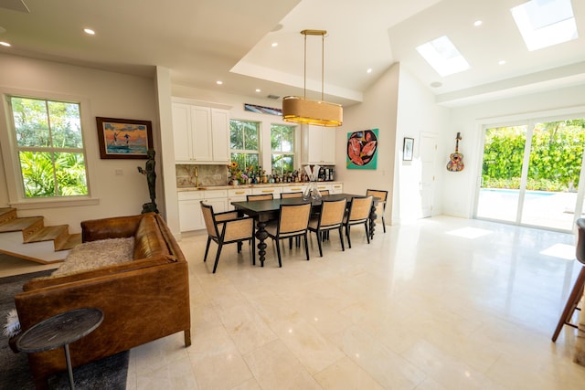 316 Southard St, Key West, FL 33040 - dining room with a skylight, vaulted ceiling, recessed lighting, and stairway