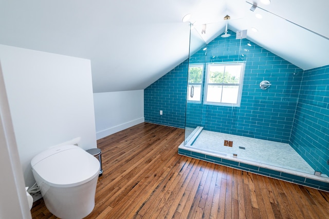 316 Southard St, Key West, FL 33040 - bathroom featuring a shower stall, wood-type flooring, lofted ceiling, toilet, and baseboards