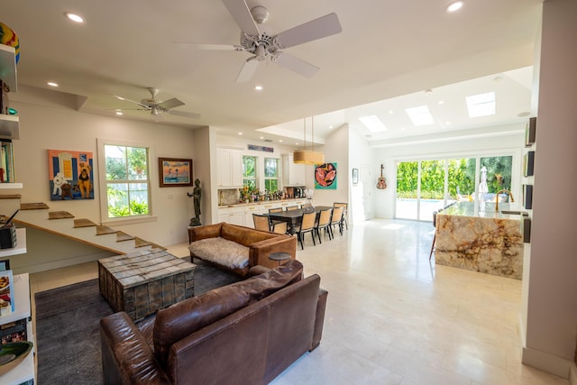 316 Southard St, Key West, FL 33040 - living area featuring healthy amount of natural light, recessed lighting, a skylight, and a ceiling fan