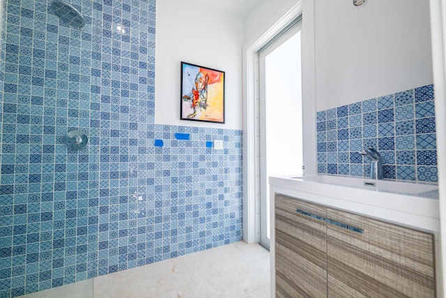 316 Southard St, Key West, FL 33040 - bathroom with tile walls, tile patterned floors, a wainscoted wall, and vanity
