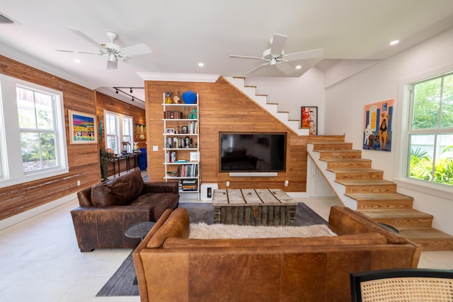 316 Southard St, Key West, FL 33040 - living room with a ceiling fan, wood walls, stairs, recessed lighting, and track lighting