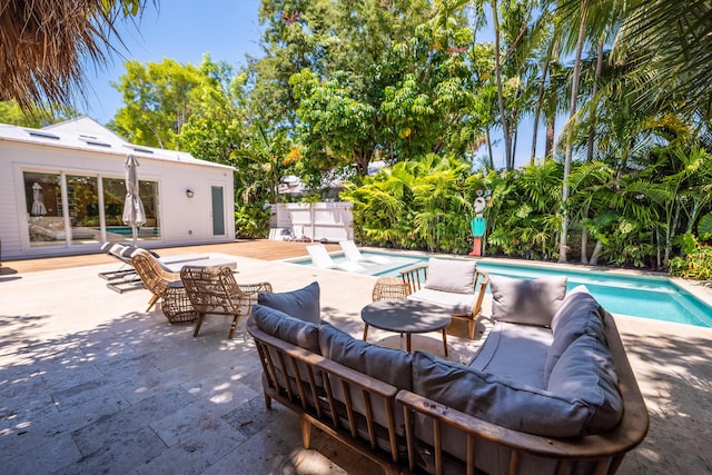 316 Southard St, Key West, FL 33040 - view of patio / terrace featuring an outdoor pool, outdoor lounge area, and an outbuilding