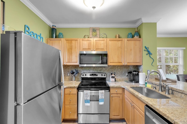 kitchen featuring light brown cabinetry, sink, backsplash, light stone counters, and stainless steel appliances