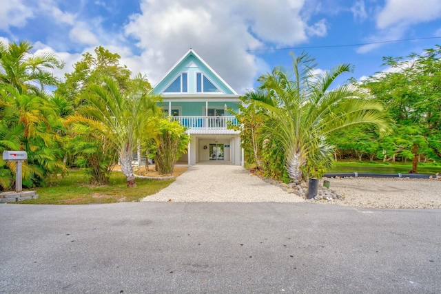 coastal home with a carport and driveway