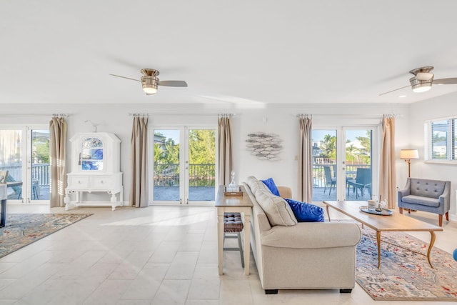 living room with french doors and ceiling fan