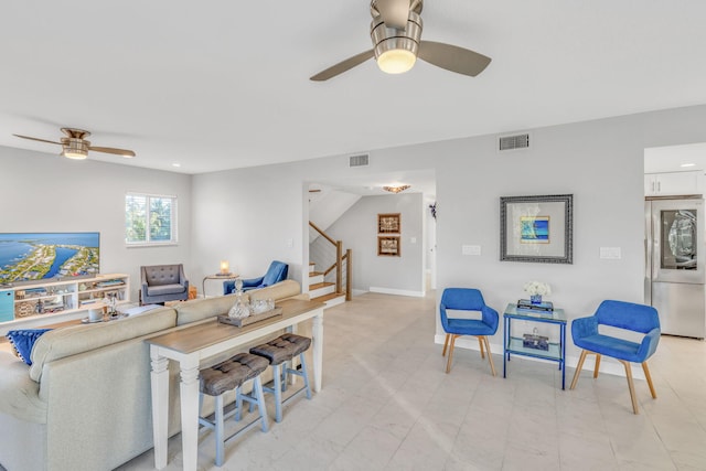 living room with ceiling fan