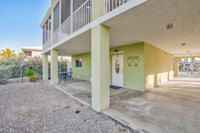 property entrance with a patio area