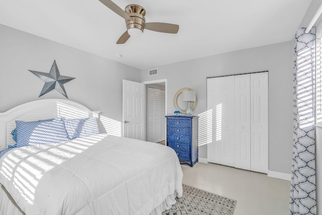 bedroom featuring ceiling fan and a closet