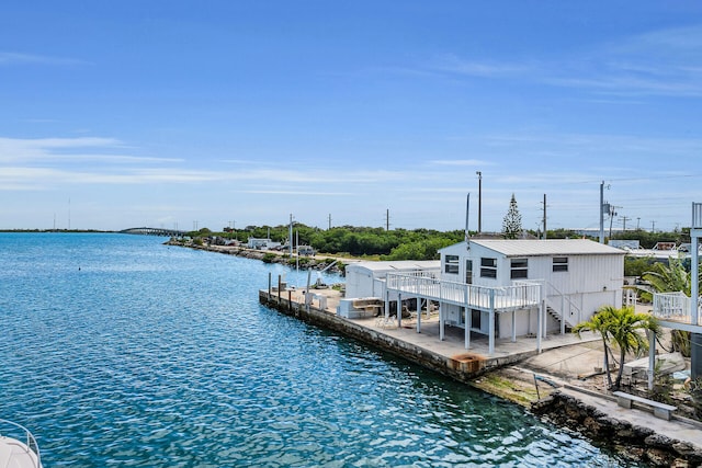 dock area with a deck with water view