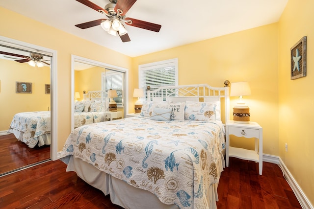 bedroom with dark wood-type flooring and ceiling fan