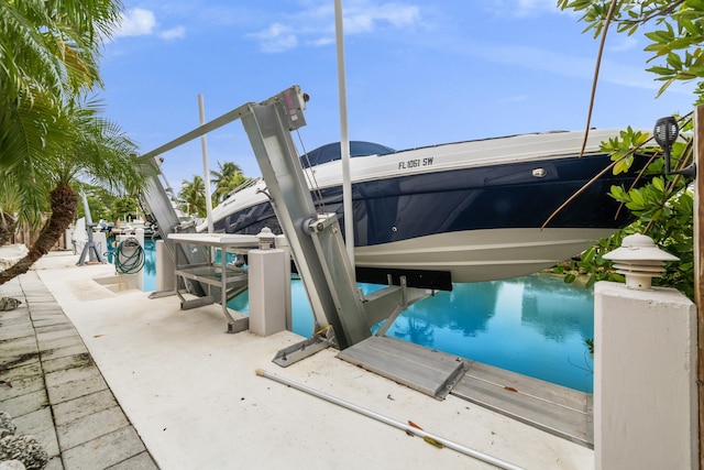 view of pool with a boat dock