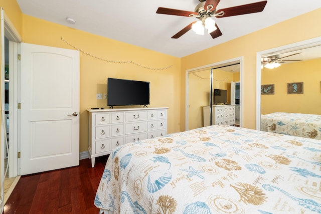 bedroom featuring dark wood-type flooring and ceiling fan