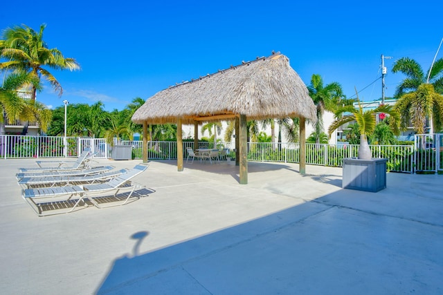 view of property's community featuring a gazebo and a patio area