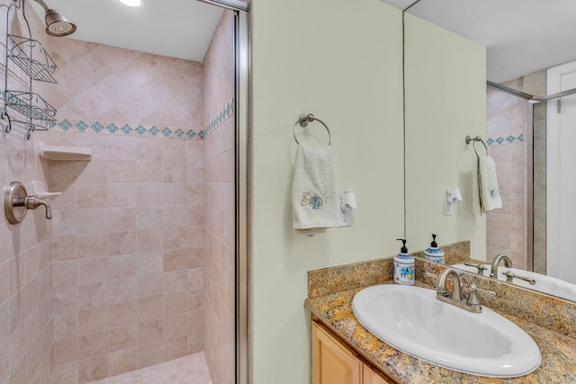 bathroom featuring vanity and walk in shower