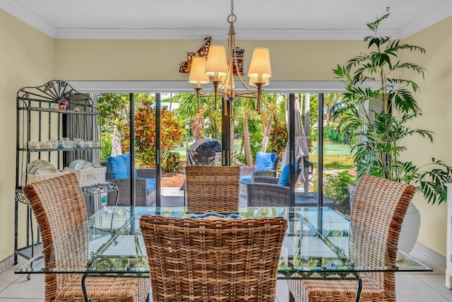 tiled dining room featuring crown molding and an inviting chandelier