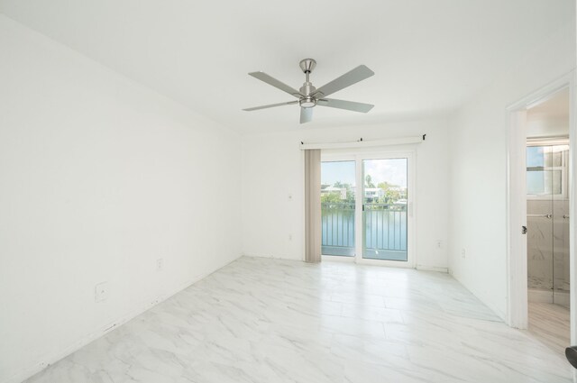 spare room featuring ceiling fan