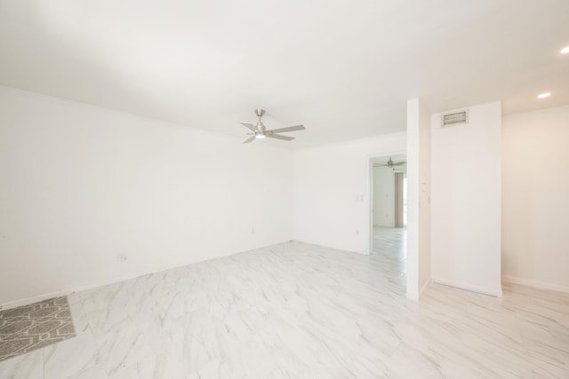 unfurnished room with ceiling fan