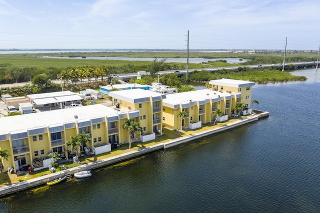 bird's eye view with a water view