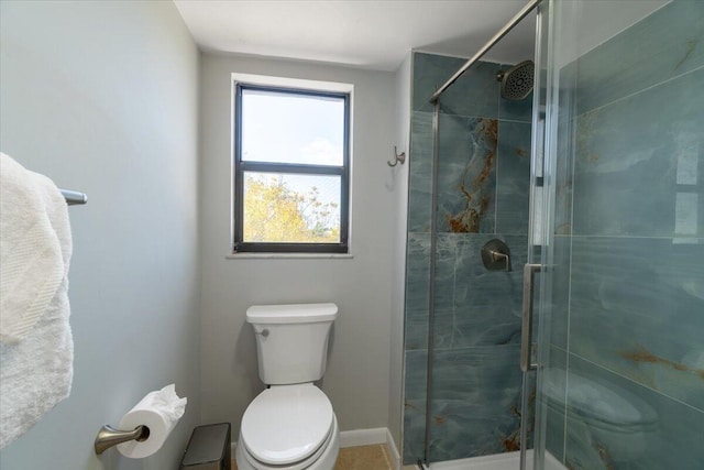 1998 Overseas Hwy Unit A31, Marathon, FL 33050 - bathroom with toilet, a stall shower, and baseboards