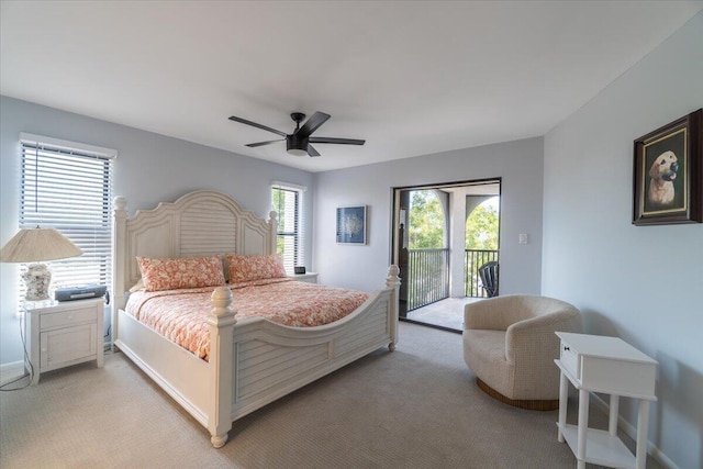 1998 Overseas Hwy Unit A31, Marathon, FL 33050 - bedroom featuring light colored carpet, ceiling fan, baseboards, and access to outside