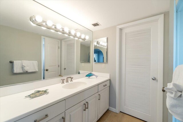 1998 Overseas Hwy Unit A31, Marathon, FL 33050 - bathroom featuring tile patterned floors, vanity, a closet, and visible vents