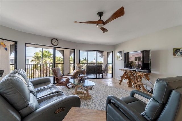 1998 Overseas Hwy Unit A31, Marathon, FL 33050 - tiled living area featuring baseboards and a ceiling fan