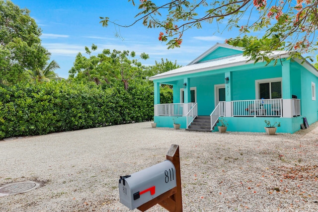 811 La Paloma Rd, Key Largo, FL 33037 - view of front of property featuring covered porch