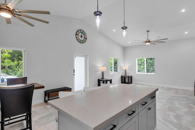 811 La Paloma Rd, Key Largo, FL 33037 - kitchen with a ceiling fan, open floor plan, high vaulted ceiling, pendant lighting, and recessed lighting