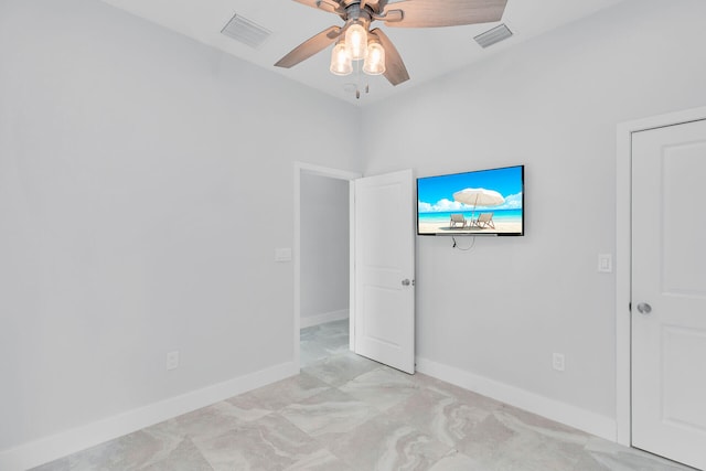 811 La Paloma Rd, Key Largo, FL 33037 - unfurnished bedroom featuring baseboards and a ceiling fan