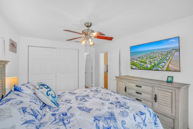 bedroom featuring ceiling fan and a closet