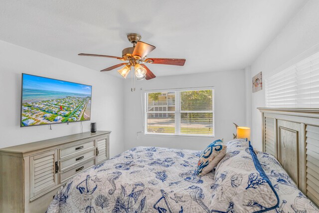 bedroom featuring ceiling fan